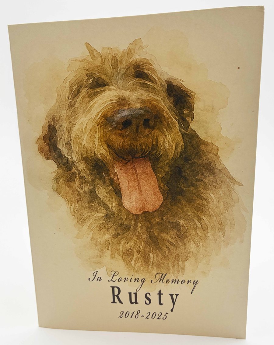Printed watercolor card of Rusty, a shaggy dog, reading In Loving Memory, Rusty, 2018-2025